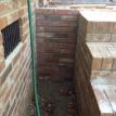 Quality brick work connecting with the previous foundation